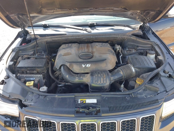 2015 Jeep Grand Cherokee Overland with VIN 1C4RJECG3FC635327, listed as a IAAI auction lot 41910559 with 118,519 mi miles and . Bid and sale history available at DreamBid. Image 10.