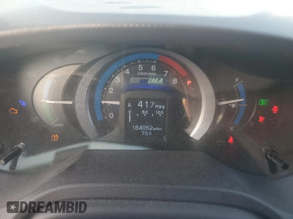 2010 Honda Insight EX with VIN JHMZE2H72AS025427, listed as a Copart auction lot 54983775 with 184,052 mi miles and Salvage Title. Bid and sale history available at DreamBid. Image 9.