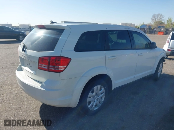 2015 Dodge Journey SE z VIN 3C4PDCAB4FT600293, wystawiony jako IAAI lot #41981386 z przebiegiem 143 573 mil mil oraz . Historia ofert i sprzedaży dostępna na DreamBid. Obrazek 4.