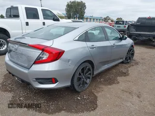 2021 Honda Civic Sport with VIN 2HGFC2F83MH510243, listed as a IAAI auction lot 41856857 with 95,739 mi miles and . Bid and sale history available at DreamBid. Image 4.