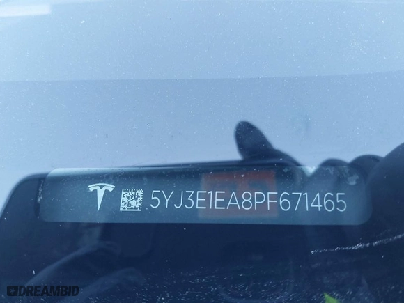 2023 Tesla Model 3 with VIN 5YJ3E1EA8PF671465, listed as a IAAI auction lot 41599200 with 21,859 mi miles. Bid and sale history available at carsss.com. Image 9.