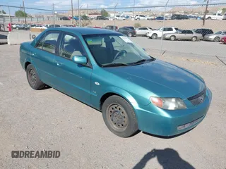 2002 Mazda Protege DX z VIN JM1BJ225021606891, wystawiony jako IAAI lot #42011997 z przebiegiem 134 758 mil mil oraz . Historia ofert i sprzedaży dostępna na DreamBid. Obrazek 1.