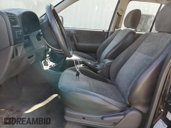 2000 Isuzu Rodeo S with VIN 4S2CK58W7Y4309261, listed as a Copart auction lot 54000775 with 187,949 mi miles and Salvage title. Bid and sale history available at DreamBid. Image 7.