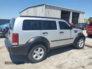 2007 Dodge Nitro SXT z VIN 1D8GT28K97W595592, wystawiony jako Copart lot #58141035 z przebiegiem 149 107 mil mil oraz Czysty tytuł • Clean title. Historia ofert i sprzedaży dostępna na DreamBid. Obrazek 3.