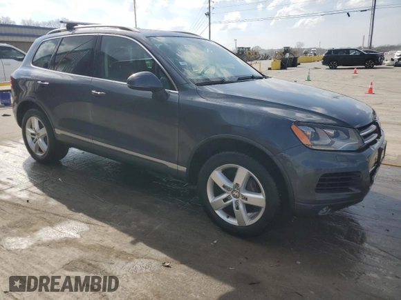 2011 Volkswagen Touareg Sport with VIN WVGFF9BPXBD005821, listed as a Copart auction lot 49391505 with 111,938 mi miles and Salvage Title. Bid and sale history available at DreamBid. Image 4.