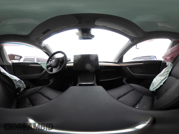 2023 Tesla Model Y Long Range with VIN 7SAYGDEE7PF673988, listed as a IAAI auction lot 41057651 with 29,683 mi miles and . Bid and sale history available at DreamBid. Image 20.