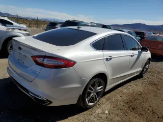 2014 Ford Fusion Titanium with VIN 3FA6P0K93ER103394, listed as a Copart auction lot 88048375 with 126,570 mi miles and Salvage Title. Bid and sale history available at DreamBid. Image 3.
