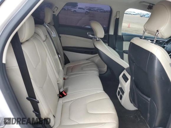 2017 Ford Edge Titanium z VIN 2FMPK3K95HBB59849, wystawiony jako Copart lot #54627325 z przebiegiem 136 548 mil mil oraz Szkoda całkowita • Salvage title. Historia ofert i sprzedaży dostępna na DreamBid. Obrazek 11.