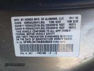 2010 Honda Odyssey EX-L with VIN 5FNRL3H79AB048049, listed as a IAAI auction lot 41440910 with 142,385 mi miles. Bid and sale history available at carsss.com. Image 9.