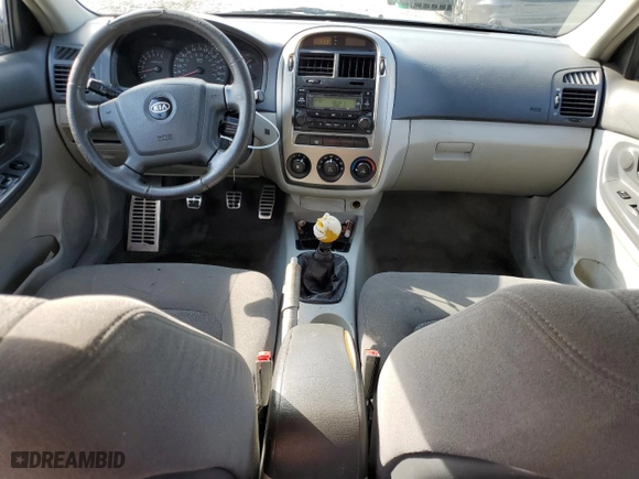 2005 Kia Spectra with VIN KNAFE161155153320, listed as a Copart auction lot 55231794 with 149,492 mi miles and Salvage Title. Bid and sale history available at carsss.com. Image 8.