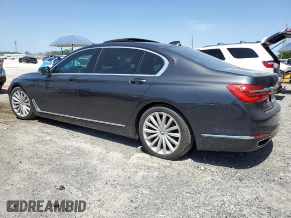 2017 BMW 7 Series 740i z VIN WBA7E2C30HG741105, wystawiony jako Copart lot #56632005 z przebiegiem 95 162 mil mil oraz Czysty tytuł • Clean title. Historia ofert i sprzedaży dostępna na DreamBid. Obrazek 2.