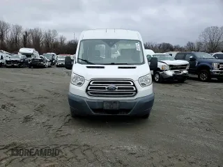 2015 Ford Transit Cargo with VIN 1FTYE1CM7FKA24477, listed as a Copart auction lot 86310214 with 54,098 mi miles and Salvage title. Bid and sale history available at DreamBid. Image 14.