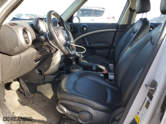 2011 MINI Cooper Countryman with VIN WMWZB3C50BWM01197, listed as a Copart auction lot 46163955 with 149,156 mi miles and Salvage Title. Bid and sale history available at carsss.com. Image 7.