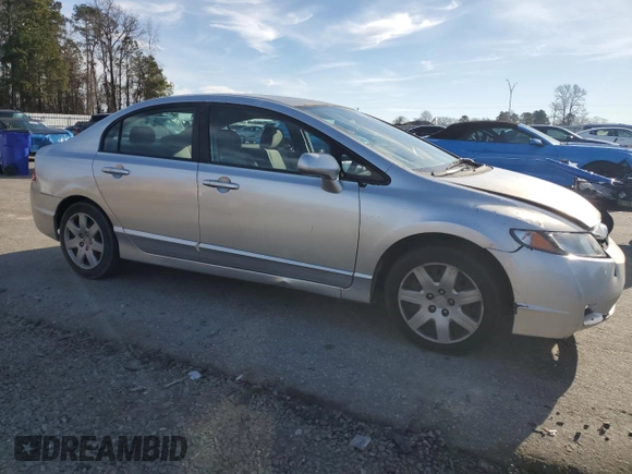 2010 Honda Civic LX with VIN 2HGFA1F57AH327476, listed as a Copart auction lot 45473805 with 202,052 mi miles and Salvage Title. Bid and sale history available at DreamBid. Image 4.