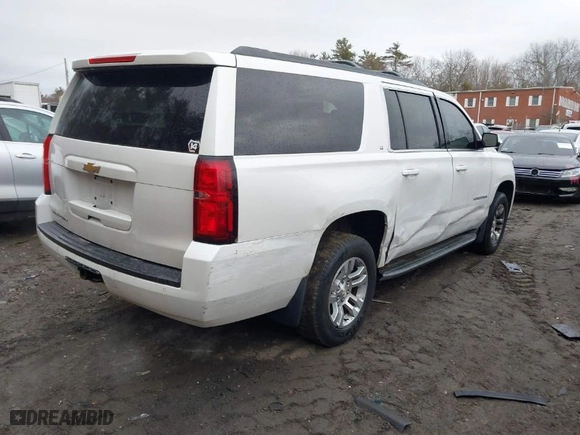 2016 Chevrolet Suburban LT with VIN 1GNSKHKC2GR182080, listed as a IAAI auction lot 41666445 with 148,661 mi miles. Bid and sale history available at carsss.com. Image 4.