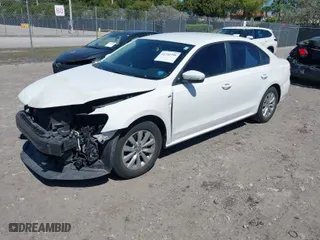 2015 Volkswagen Passat 1.8T S with VIN 1VWAT7A35FC038826, listed as a IAAI auction lot 41742799 with 123,468 mi miles. Bid and sale history available at carsss.com. Image 2.