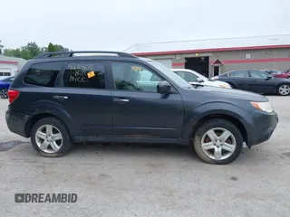 2009 Subaru Forester X with VIN JF2SH63679H701039, listed as a IAAI auction lot 42701876 with 127,401 mi miles and . Bid and sale history available at DreamBid. Image 14.
