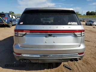 2020 Lincoln Aviator Reserve z VIN 5LM5J7XC2LGL35647, wystawiony jako Copart lot #71263444 z przebiegiem 56 792 mil mil oraz Szkoda całkowita • Salvage title. Historia ofert i sprzedaży dostępna na DreamBid. Obrazek 6.