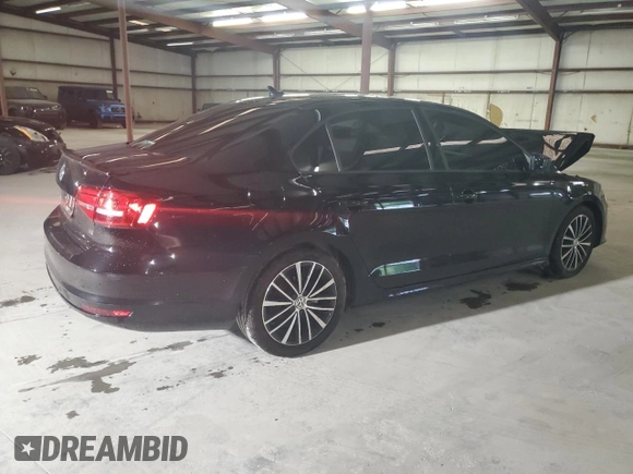 2015 Volkswagen Jetta SE with VIN 3VWD17AJ0FM211443, listed as a Copart auction lot 56900945 with 68,581 mi miles and Salvage title. Bid and sale history available at DreamBid. Image 3.