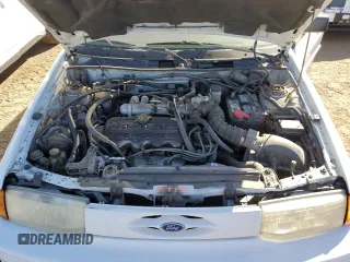1994 Ford Escort z VIN 3FARP13J4RR122084, wystawiony jako Copart lot #73184804 z przebiegiem 238 604 mil mil oraz Nie do naprawy. Historia ofert i sprzedaży dostępna na DreamBid. Obrazek 11.