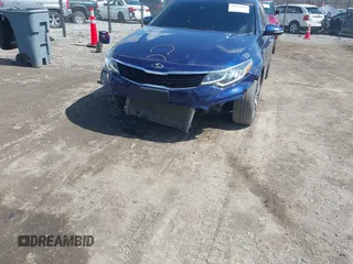 2019 Kia Optima LX with VIN 5XXGT4L30KG283410, listed as a IAAI auction lot 41899185 with 100,189 mi miles and . Bid and sale history available at carsss.com. Image 6.