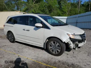 2016 Honda Odyssey Touring Elite with VIN 5FNRL5H97GB129217, listed as a Copart auction lot 52177765 with 138,045 mi miles and Salvage Title. Bid and sale history available at DreamBid. Image 4.