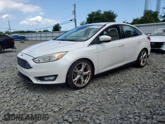 2016 Ford Focus Titanium with VIN 1FADP3J29GL223778, listed as a Copart auction lot 66171735 with Not provided miles and Salvage title. Bid and sale history available at DreamBid. Image 1.