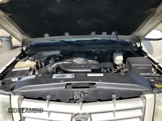 2003 Cadillac Escalade EXT z VIN 3GYEK63N43G144901, wystawiony jako Copart lot #50575195 z przebiegiem 236 328 mil mil oraz Tytuł czysty. Historia ofert i sprzedaży dostępna na DreamBid. Obrazek 11.