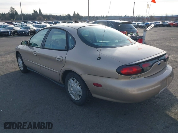 1999 Ford Taurus SE with VIN 1FAFP53U4XG223246, listed as a IAAI auction lot 41570969 with 59,064 mi miles. Bid and sale history available at carsss.com. Image 3.