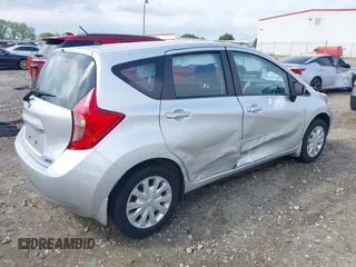 2015 Nissan Note SV with VIN 3N1CE2CPXFL440194, listed as a IAAI auction lot 42112943 with 95,623 mi miles and . Bid and sale history available at DreamBid. Image 4.