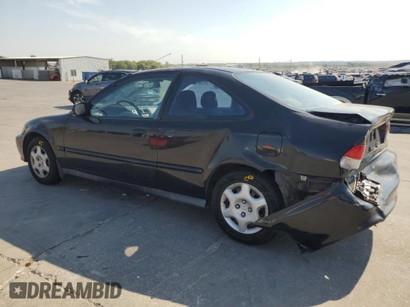 2000 Honda Civic EX with VIN 1HGEJ8245YL014036, listed as a Copart auction lot 68867154 with 163,759 mi miles and Salvage Title. Bid and sale history available at carsss.com. Image 2.