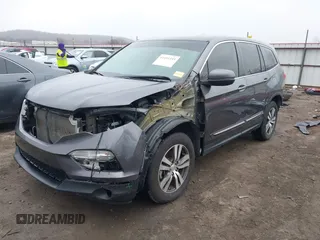 2017 Honda Pilot EX-L with VIN 5FNYF6H55HB063063, listed as a IAAI auction lot 41491193 with 75,444 mi miles and . Bid and sale history available at DreamBid. Image 2.