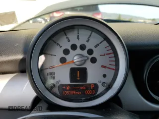2010 MINI Hardtop with VIN WMWMF3C52ATZ65593, listed as a Copart auction lot 50107445 with 105,389 mi miles and Salvage title. Bid and sale history available at DreamBid. Image 9.