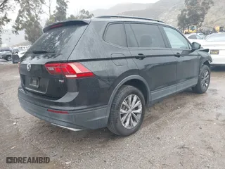 2018 Volkswagen Tiguan S with VIN 3VV1B7AX0JM101932, listed as a IAAI auction lot 41725112 with 143,780 mi miles. Bid and sale history available at carsss.com. Image 4.