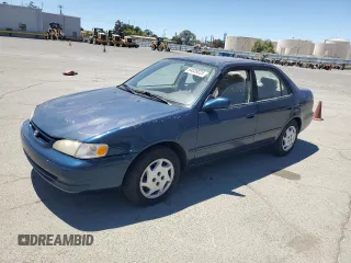 1999 Toyota Corolla VE with VIN 1NXBR12E0XZ281759, listed as a Copart auction lot 64039025 with 139,414 mi miles and Salvage title. Bid and sale history available at DreamBid. Image 1.