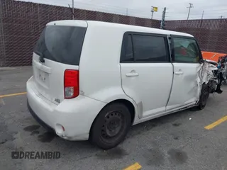 2014 Scion xB with VIN JTLZE4FEXEJ054060, listed as a IAAI auction lot 42096159 with 211,994 mi miles. Bid and sale history available at carsss.com. Image 4.