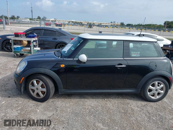 2010 MINI Hardtop with VIN WMWMF3C5XATU77265, listed as a IAAI auction lot 42007797 with 28,856 mi miles and . Bid and sale history available at DreamBid. Image 14.