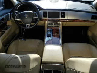 2014 Jaguar XF SC with VIN SAJWA0EX3E8U29494, listed as a Copart auction lot 76844324 with 103,776 mi miles and Clean Title. Bid and sale history available at DreamBid. Image 8.