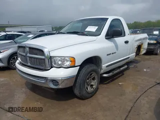 2002 Dodge 1500 ST with VIN 1D7HU16N82J214155, listed as a IAAI auction lot 42112882 with 214,411 mi miles. Bid and sale history available at carsss.com. Image 18.