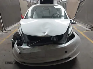 2024 Tesla Model 3 with VIN 5YJ3E1EA9RF836300, listed as a IAAI auction lot 41988009 with 9,989 mi miles. Bid and sale history available at carsss.com. Image 13.