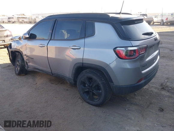 2018 Jeep Compass Latitude with VIN 3C4NJDBB1JT326239, listed as a IAAI auction lot 41325854 with 79,192 mi miles and . Bid and sale history available at DreamBid. Image 3.