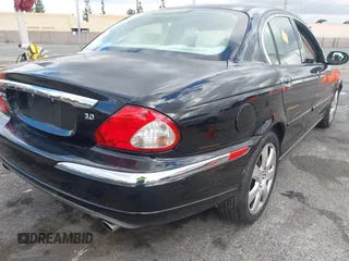 2004 Jaguar X-Type with VIN SAJEA51C44WD56659, listed as a IAAI auction lot 41712395 with Not Provided miles and . Bid and sale history available at DreamBid. Image 4.