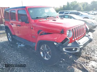 2020 Jeep Wrangler Unlimited Sahara High Altitude with VIN 1C4HJXEG2LW182641, listed as a IAAI auction lot 40130890 with 79,984 mi miles and . Bid and sale history available at DreamBid. Image 6.