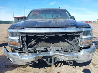 2016 Chevrolet Silverado 1500 LT with VIN 1GCVKREC3GZ121358, listed as a IAAI auction lot 41693996 with 103,811 mi miles and . Bid and sale history available at DreamBid. Image 13.