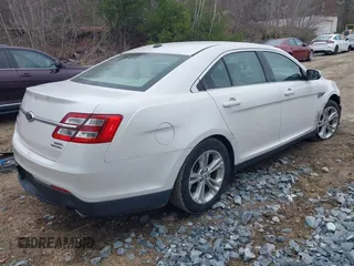 2013 Ford Taurus SEL with VIN 1FAHP2E87DG168729, listed as a IAAI auction lot 42012757 with 89,644 mi miles. Bid and sale history available at carsss.com. Image 4.
