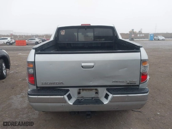 2006 Honda Ridgeline RTL with VIN 2HJYK16526H531190, listed as a IAAI auction lot 41450393 with 146,646 mi miles. Bid and sale history available at carsss.com. Image 16.