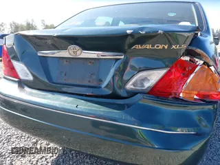 2000 Toyota Avalon XL z VIN 4T1BF28B2YU092348, wystawiony jako IAAI lot #42271599 z przebiegiem 179 560 mil mil oraz . Historia ofert i sprzedaży dostępna na DreamBid. Obrazek 6.