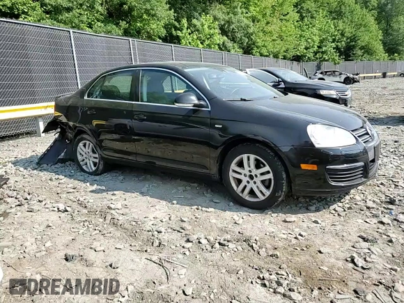 2007 Volkswagen Jetta Wolfsburg Edition z VIN 3VWEG71K67M079026, wystawiony jako Copart lot #60512895 z przebiegiem 71 380 mil mil oraz Szkoda całkowita • Salvage title. Historia ofert i sprzedaży dostępna na DreamBid. Obrazek 13.