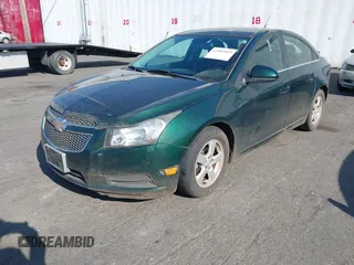 2014 Chevrolet Cruze 1LT with VIN 1G1PC5SB0E7422942, listed as a IAAI auction lot 42107523 with 137,701 mi miles and . Bid and sale history available at DreamBid. Image 2.