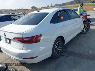 2021 Volkswagen Jetta S z VIN 3VWC57BU9MM036647, wystawiony jako IAAI lot #42107534 z przebiegiem 62 319 mil mil oraz . Historia ofert i sprzedaży dostępna na DreamBid. Obrazek 4.